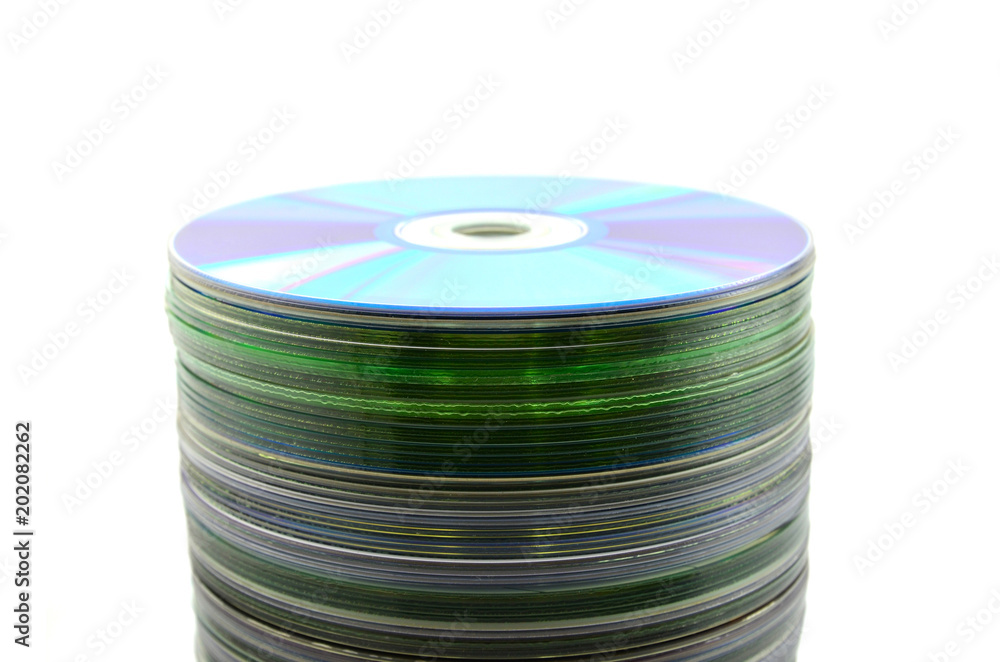 The CD stack is placed isolated on white background The CD stack is placed isolated on white background