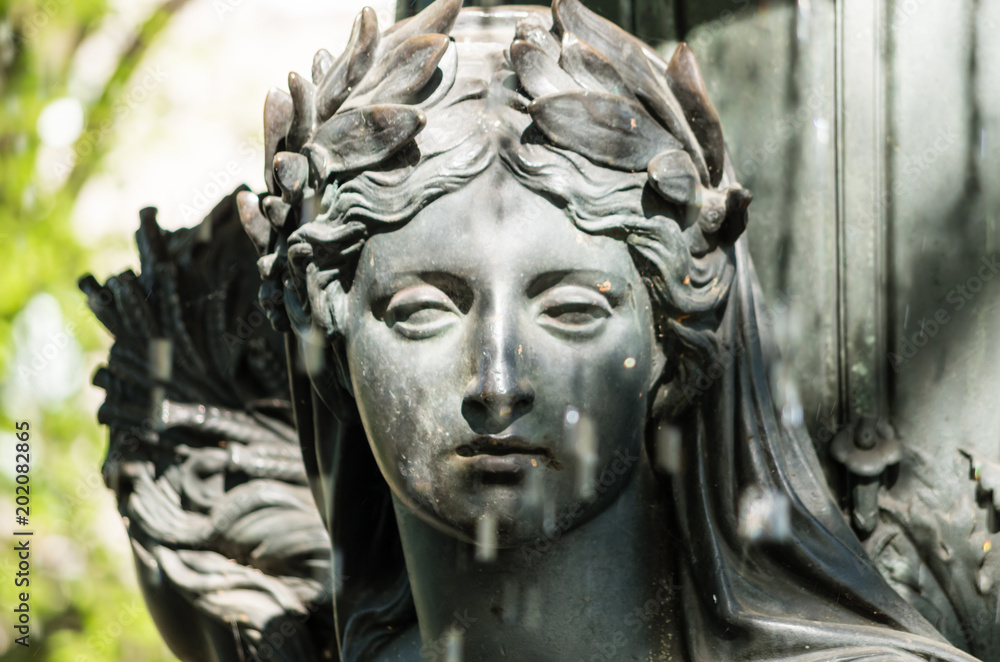 Gray Statue of Woman in Berlin, Germany