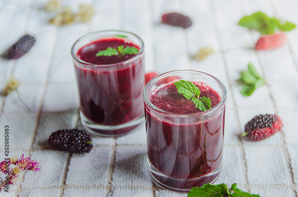 Mulberry juice and mulberry fruit, Fresh berry fruit and berry smoothies with mint Mulberry juice and mulberry fruit, Fresh berry fruit and berry smoothies with mint