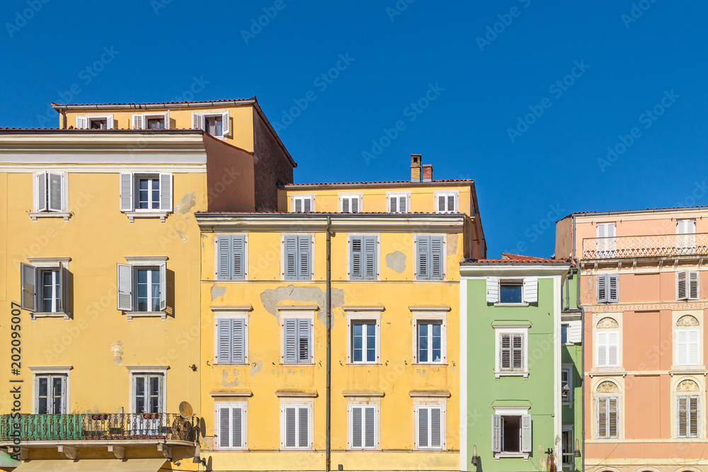Colorful facade of buildings in Piran town on Adriatic sea, one of major tourist attractions in Slovenia, Europe.