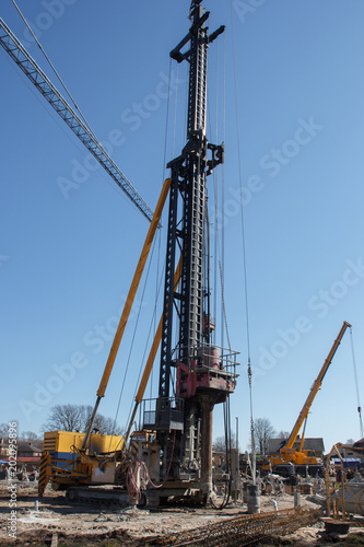 pile bore machine. A pile driver is a mechanical device used to drive piles, poles into soil to provide foundation support for buildings
