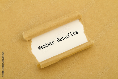 Member Benefits written under torn paper.