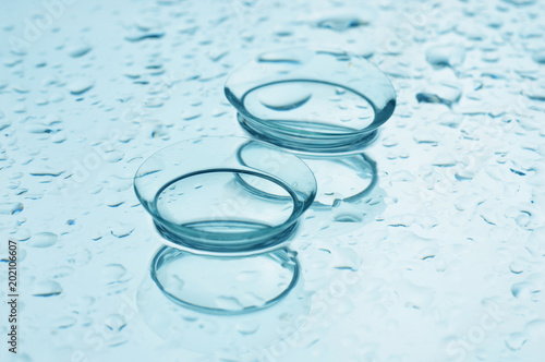 Contact lenses on blue background.