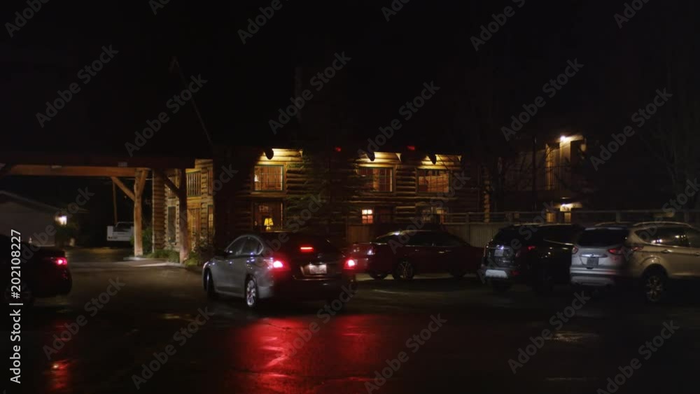 Motel lodge parking lot at night in Grants Pass Oregon Motel lodge parking lot at night in Grants Pass Oregon