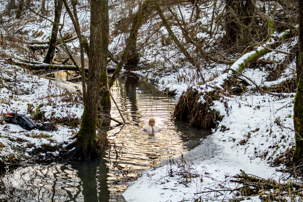 Bathing in Gorodyanka river in winter near Anisimovo village, Russia
Bathing in Gorodyanka river in winter near Anisimovo village, Russia