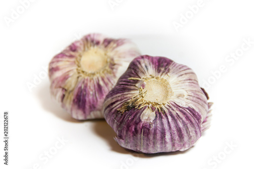 variety of violet vegetables with white background