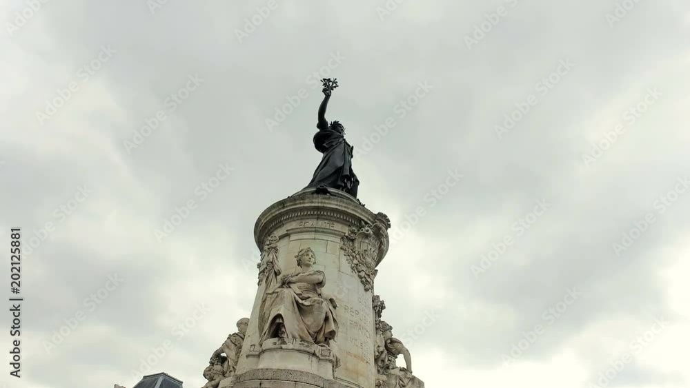 Paris. The Place de la Republique. Bronze statue of Marianne holding an olive branch Paris. The Place de la Republique. Bronze statue of Marianne holding an olive branch