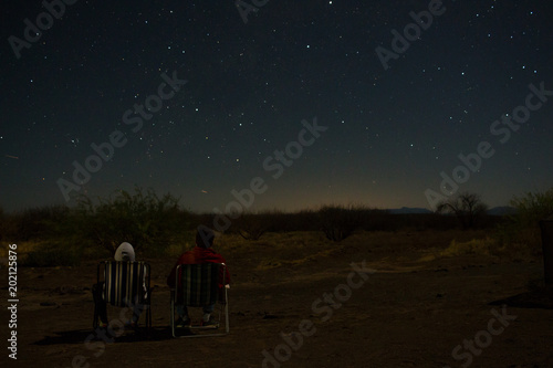 Two people watching the stars
