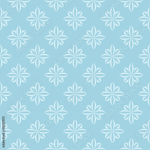 White floral ornament on blue. Seamless pattern