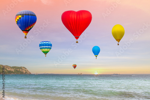 Balloons fly on the sea