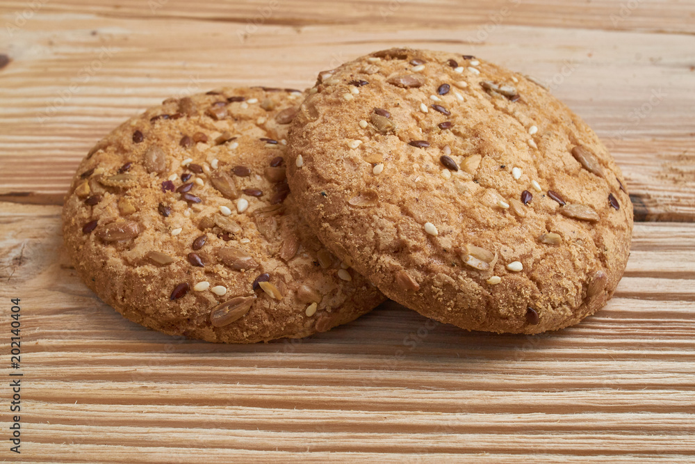 Vegan crunchy cookies with sunflower, flax seeds and sesame seeds isolated. Macro view Vegan crunchy cookies with sunflower, flax seeds and sesame seeds isolated. Macro view