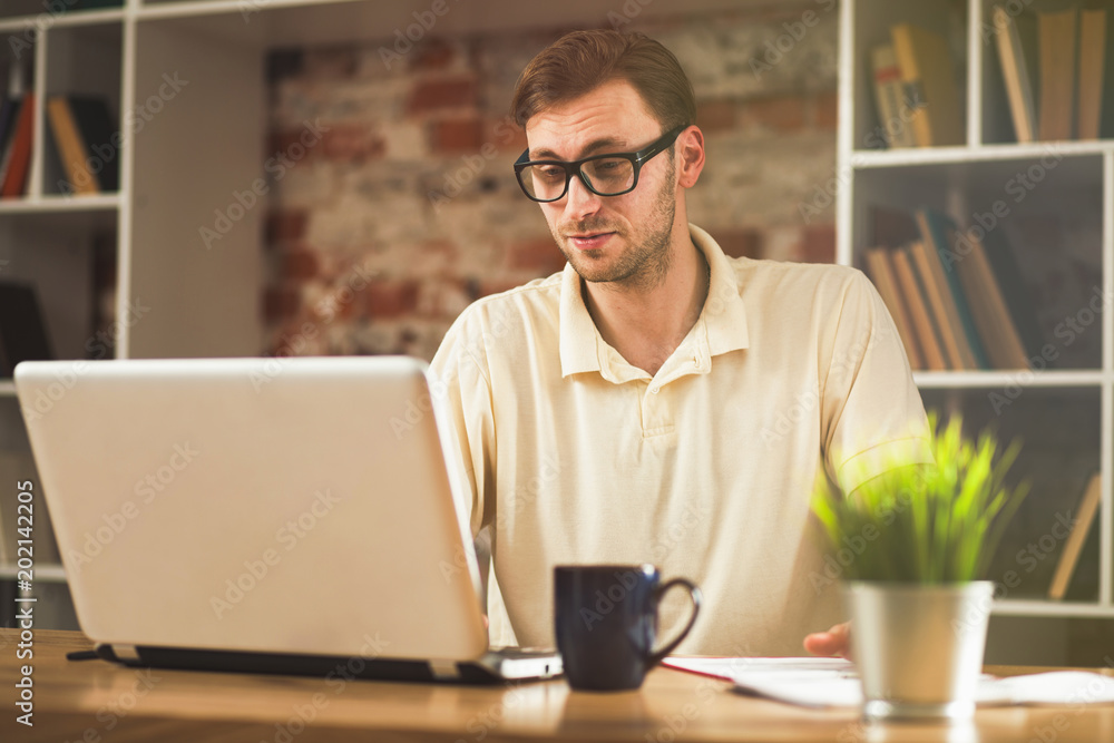 Young man with a laptop