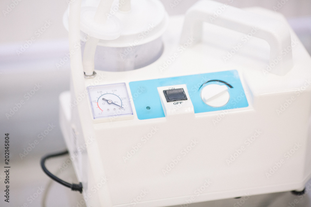 Sputum suction devices for patients. Basic Suction Pump, surgical suction device in medical operating room Sputum suction devices for patients. Basic Suction Pump, surgical suction device in medical operating room