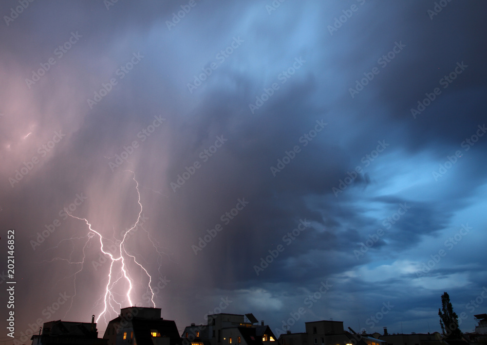Thunderstorm lights. Bright lightning thunderstorms sparkle from the cloud. Dangerous electrical flash. Levin or scintillation for weather concept. Storm weather with heavy rain. Lightning bolt strike