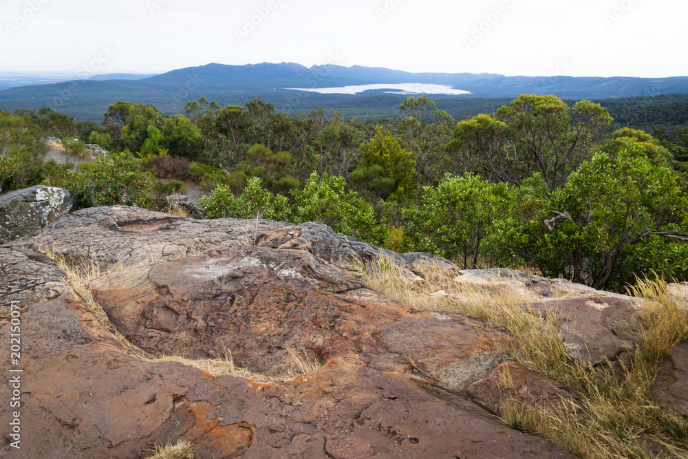 View into the valley and to a lake at Reeds Lookout, Grampians, Victoria, Australia