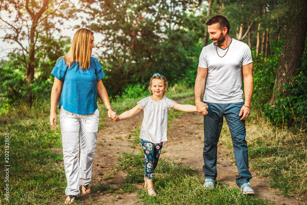 Happy pretty family have fun outdoor Happy pretty family have fun outdoor