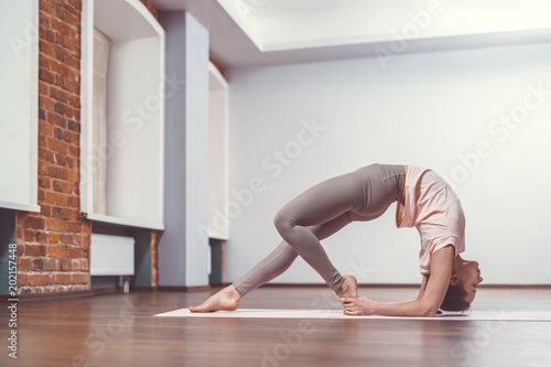 Young girl doing yoga