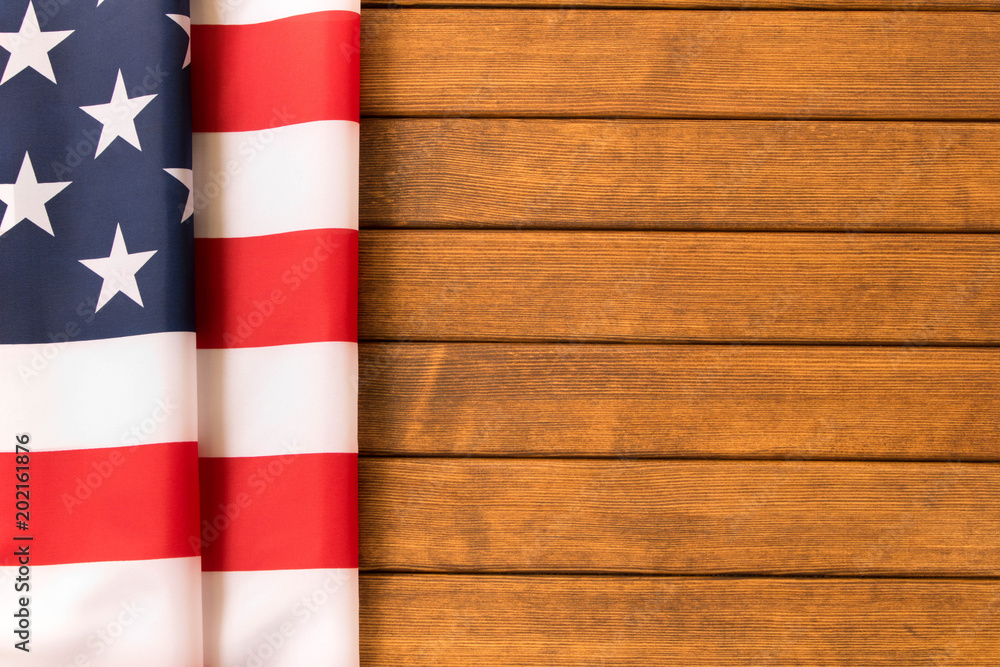 American flag on wooden background . Independence day celebration. July 4th American flag on wooden background . Independence day celebration. July 4th
