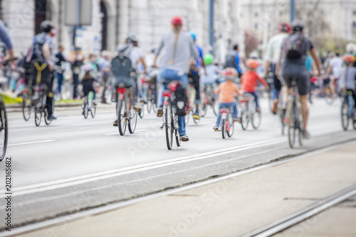 people on the bicycle in the city 