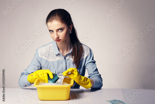 Canvas Print conceptual image on which the woman launder shady money
