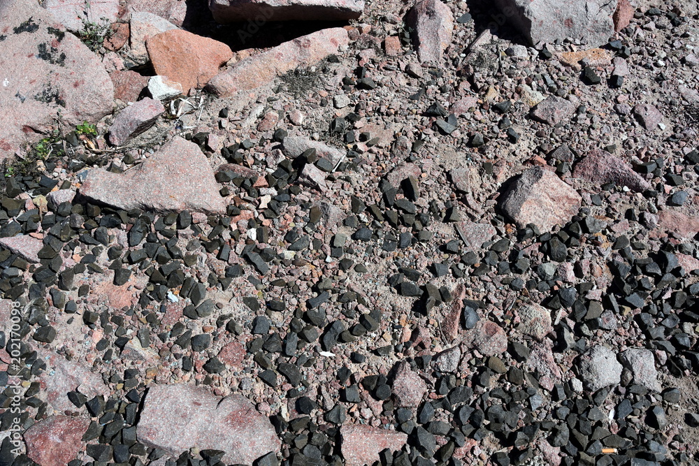 Naklejka premium Made from pebble gravel stones different shape as floor texture background. Small rocks background texture, abstract stone texture pebbles.