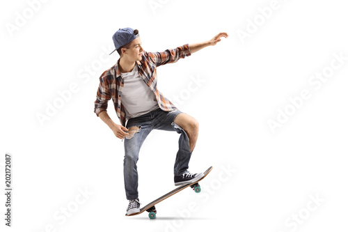 Teenage skater doing a manual