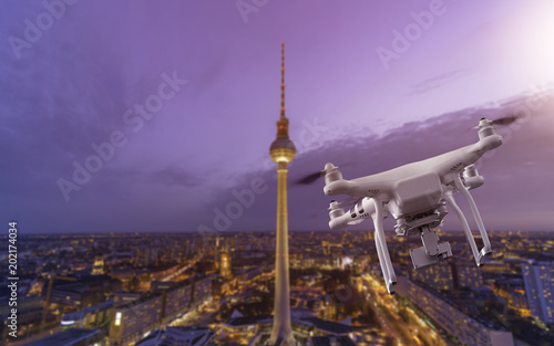 Multicopter flying over Berlin Cityscape