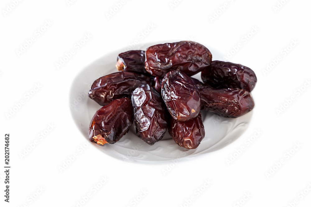 Isolated Organic Dates on white background. Close up. Isolated Organic Dates on white background. Close up.