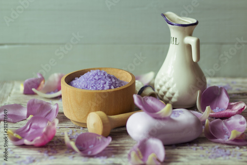 Lavender bath salt and body oil on the table