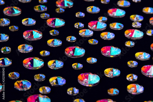 Foto Precious stones crystals in the shape a rivoli on a black background