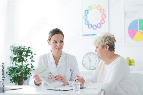 Woman during medical interview photo
