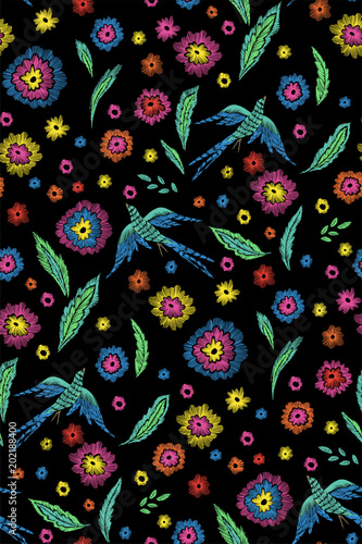 Beautiful flowers and birds seamless pattern in in retro style hand drawn. Spring summer season.Vector illustration. Embroidery design. Line art. © Elena