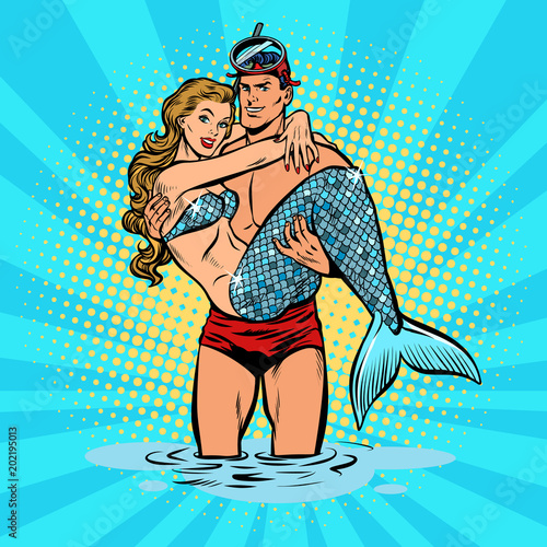 Diver male and female mermaid