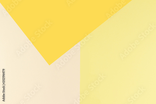 Colorful soft beige and yellow paper background.
