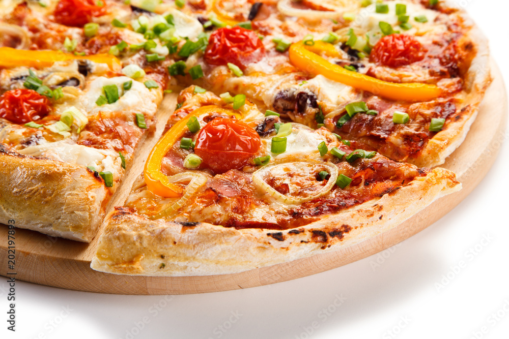 Pizza with ham and vegetables on white background Pizza with ham and vegetables on white background
