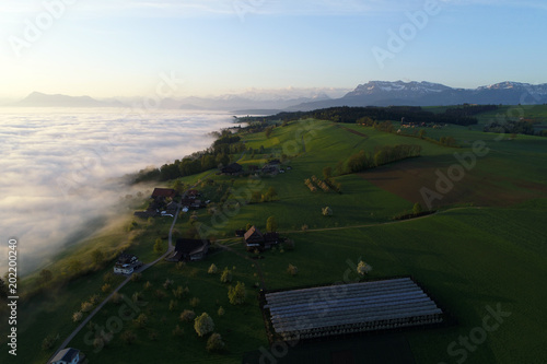 Aerial view of the Prealps in Switzerland on a spring morning with Mount Pilatus in the background