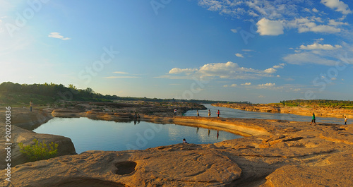 Tourist walk aroound Sam Phan Bok - The Grand Canyon of Thailand at Mekong River UBONRATCHATHANI province. Horizontal Panorama image
