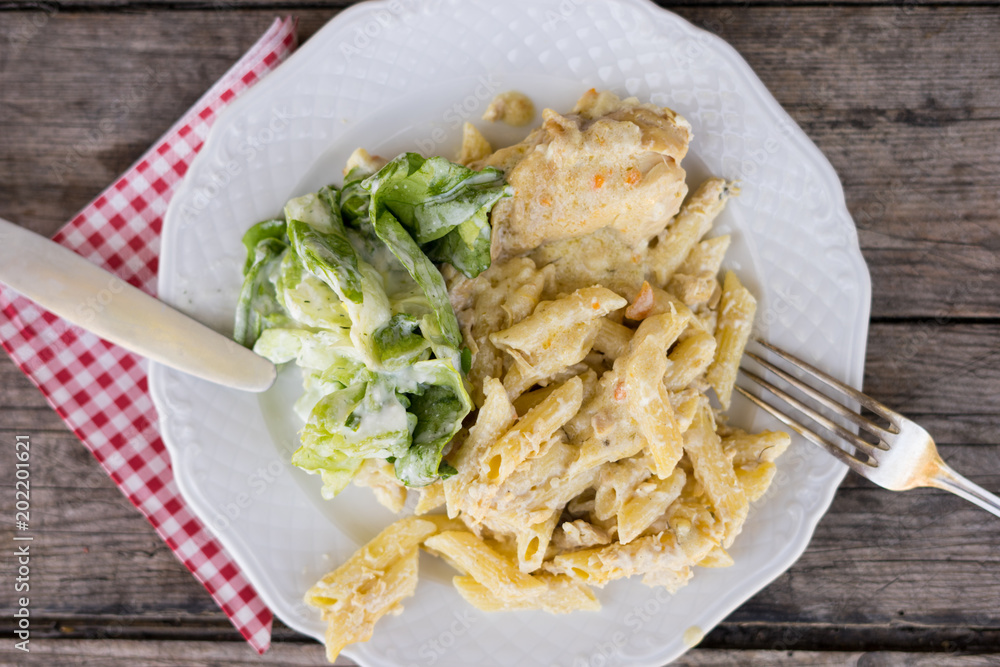 pasta with cheese and salad