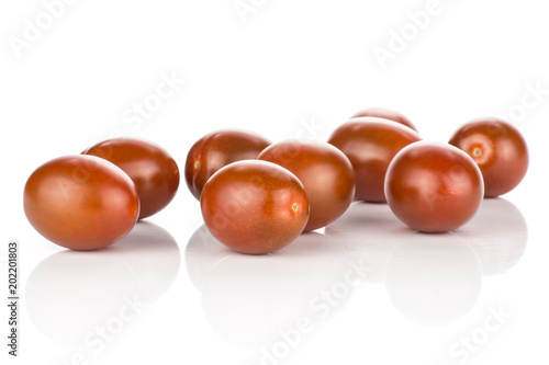 Black red grape cherry tomatoes isolated on white background ripe.