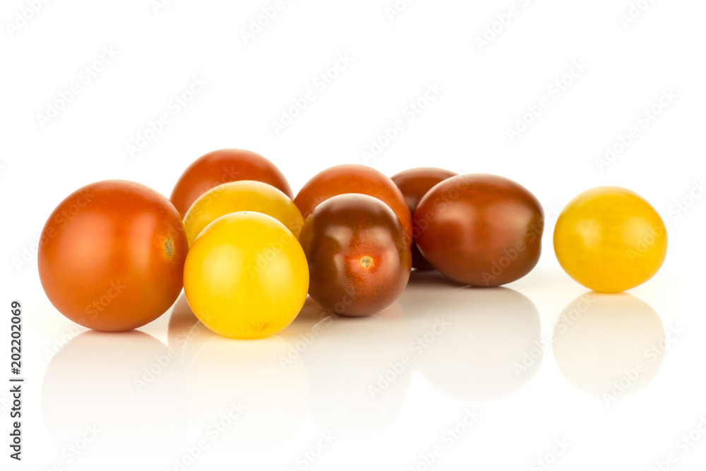 Grape cherry tomatoes mix isolated on white background yellow black red whole collection stack. Grape cherry tomatoes mix isolated on white background yellow black red whole collection stack.