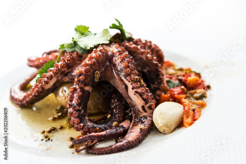 Fototapeta Naklejka Na Ścianę i Meble -  Mediterranean Octopus with vegetables and potatoes