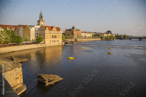 Vltava river in spring Prague  with many of turistic boats  view from Charles bridge