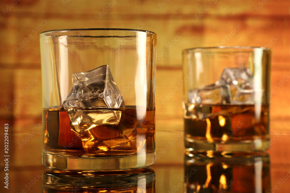 Chilled Whiskey Glass with Ice Cubes Chilled Whiskey Glass with Ice Cubes