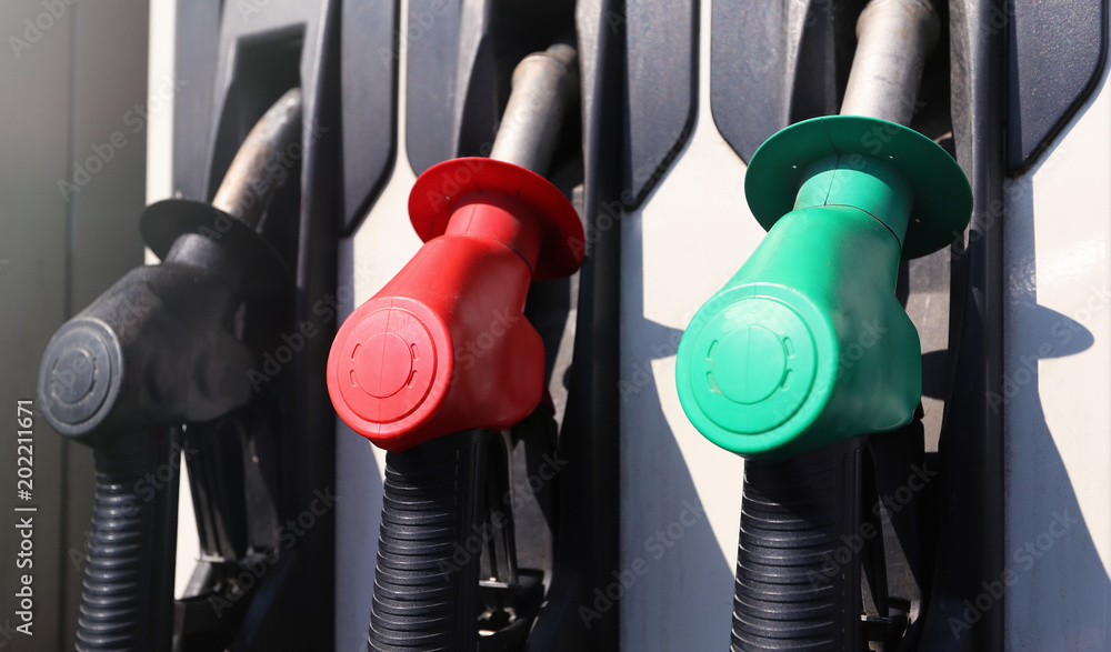 Fuel pistols close up at the gas station Fuel pistols close up at the gas station