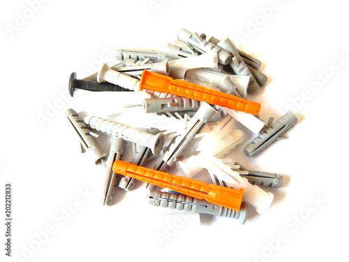 Dowels-plugs, isolated on white background. Elements of fasteners. Dowels plugs for metal screws.