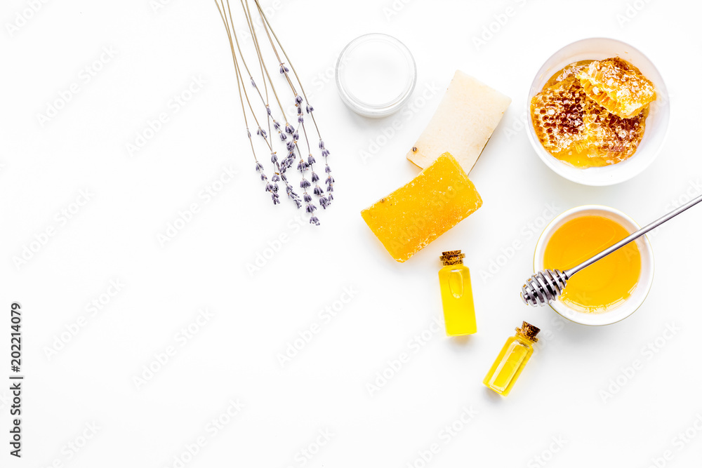 Honey as product for body, face and hair care. Cosmetics with honey. White background top view copy space Honey as product for body, face and hair care. Cosmetics with honey. White background top view copy space