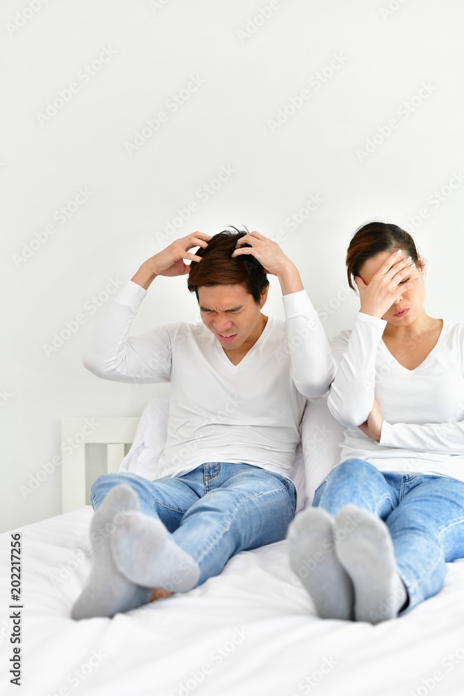 A couple lover is upset about something in the bedroom. A couple lover is upset about something in the bedroom.