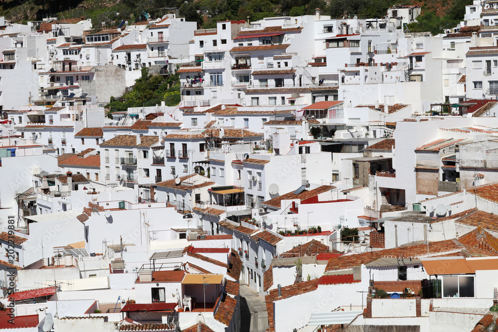 A cross section of houses in the white village of Mijas Pueblo in Spain