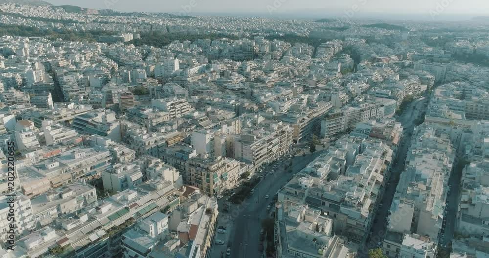 Aerial of downtown neighbourhoods streets and rooftops of Athens. Aerial of downtown neighbourhoods streets and rooftops of Athens.