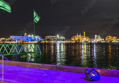 Night urban landscape in Eilat - famous resort city in Israel. Selective focu...